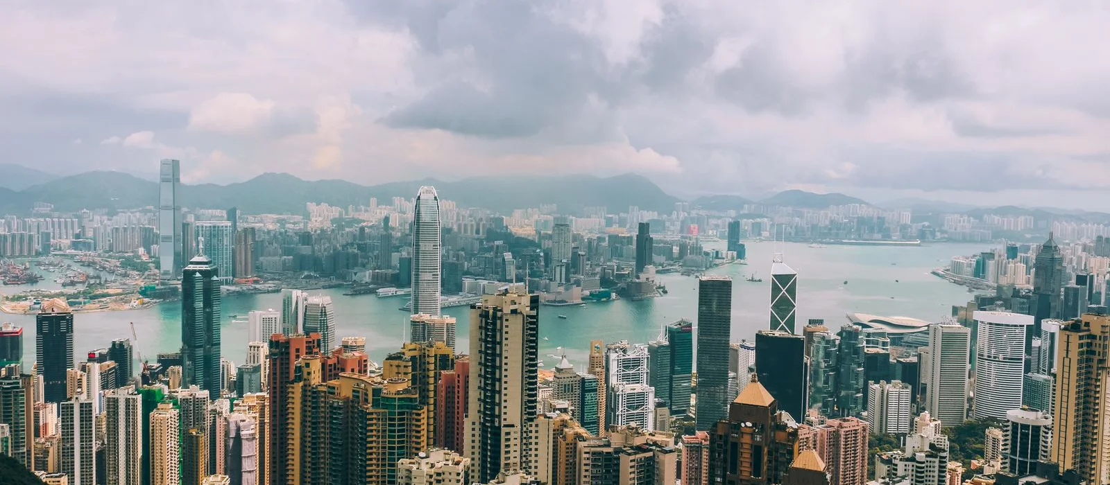 Panoramic Hong Kong skyline and Victoria Harbour viewed from Victoria Peak