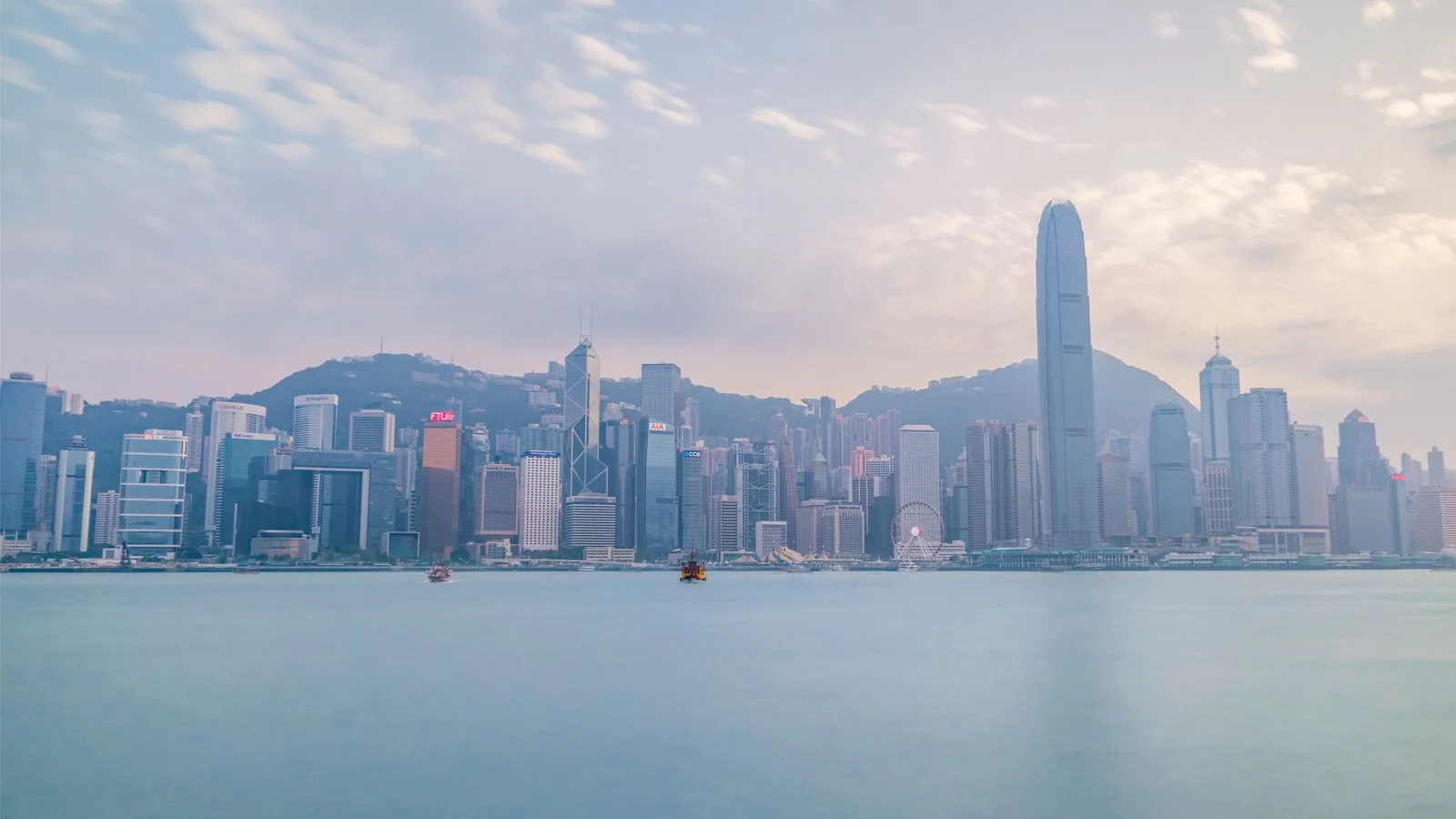 Daylight view of Hong Kong Island commercial skyline across Victoria Harbour